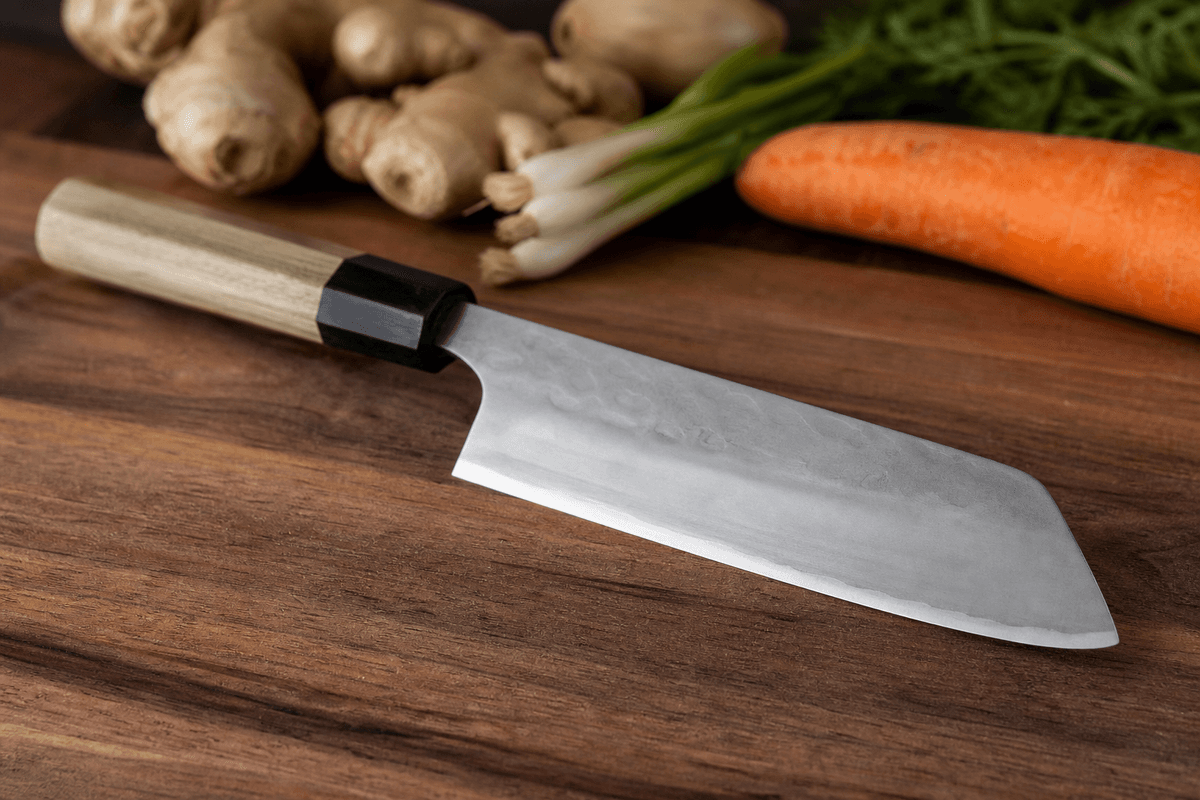 A detailed, photorealistic view of a bunka knife highlighting its everyday kitchen profile.
